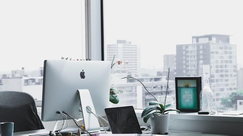 Modern creative agency workspace with multiple editing stations